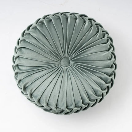 Coussin de sol et canapé vert