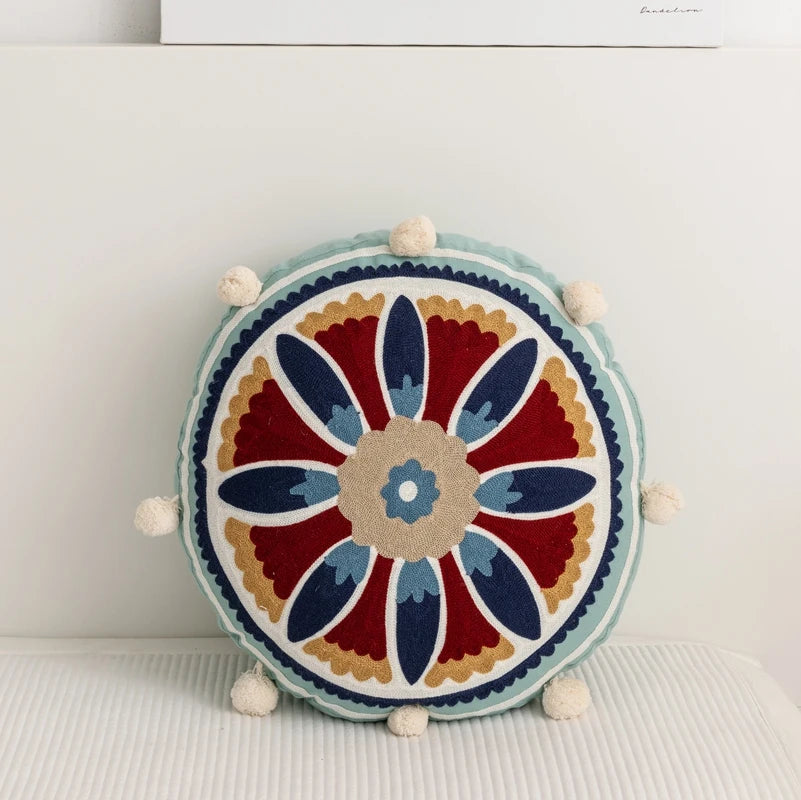 Coussin bohème rond avec pompons