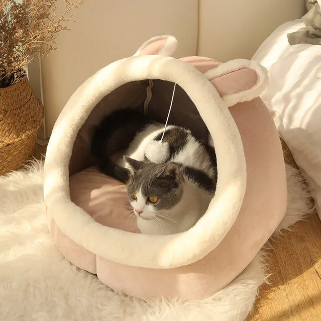 Coussin pour chat en forme de niche rose