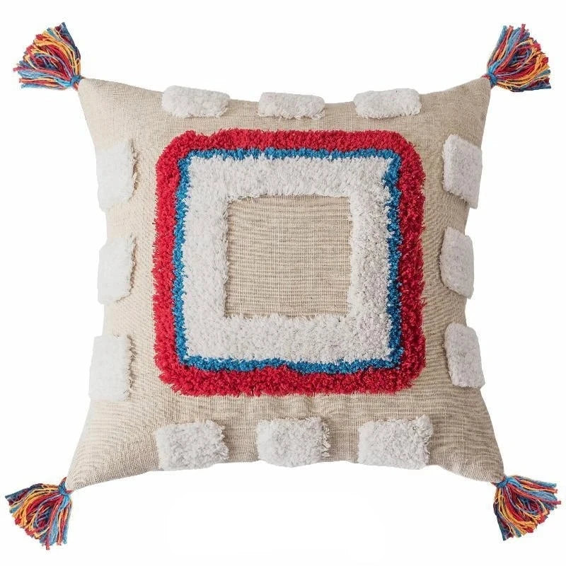 Coussin ethnique bohème colorés à franges rouge bleu beige